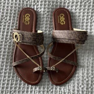 GBG Los Angeles Brown and Gold Sandals with Cross-Strap Design